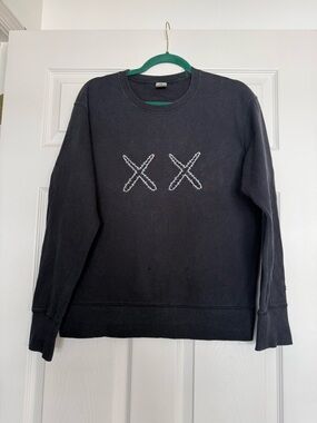KAWS x Uniqlo Sesame Street Black Crewneck Sweater White XX Stitching